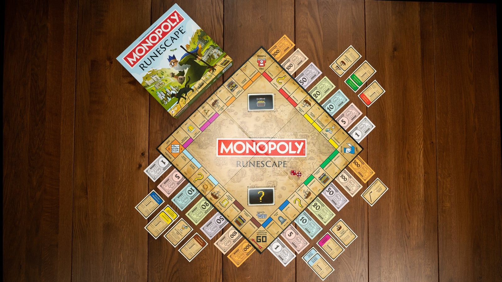 Official RuneScape Monopoly Edition board game featuring Gielinor-themed artwork and collectible packaging.